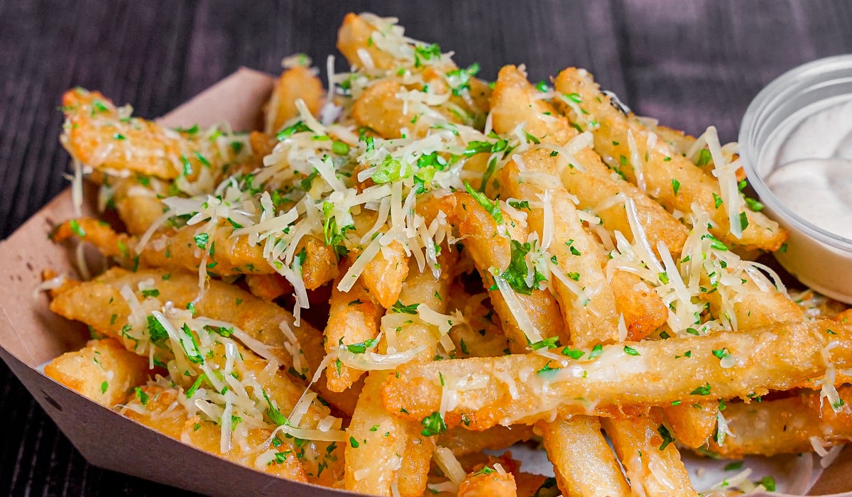 French Fries with mayo, grated cheese and parsley