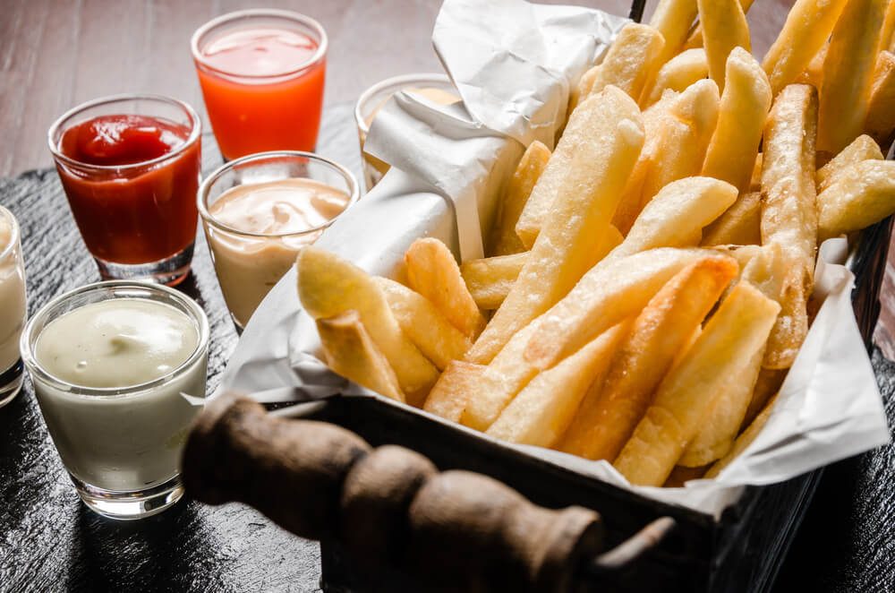 French Fries in Basket With Sauce Dipping