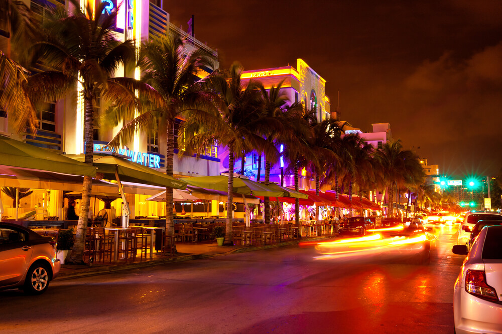 Ocean Drive Scene at Night Lights, Cars and People Having Fun, Miami Beach.
